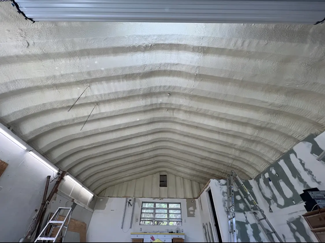 Spray polyurethane foam applied to the underside of a metal roof deck in Penn Hills